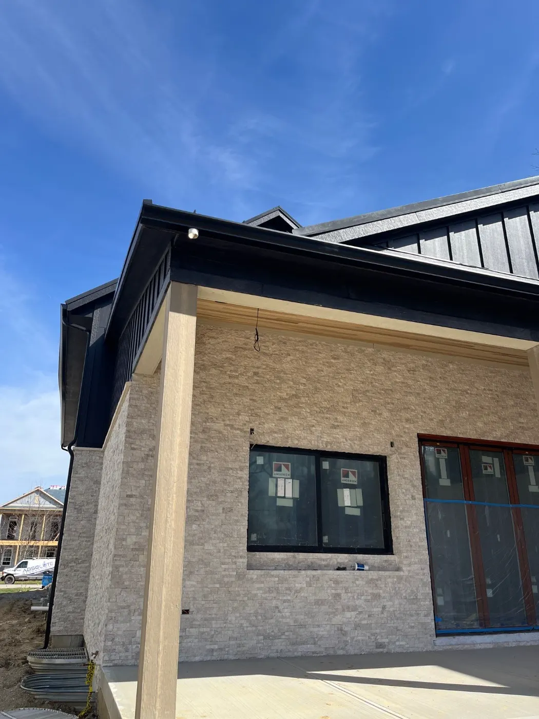 Storm damage documentation on a Harvest Meadows commercial building